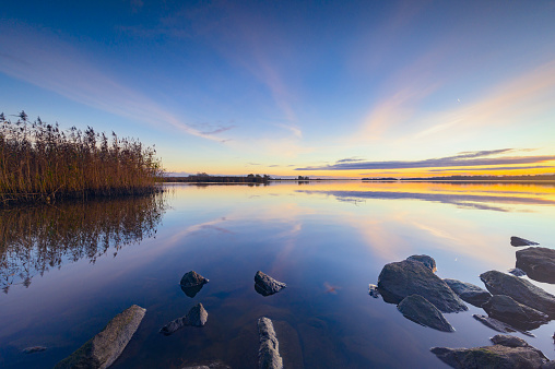 Sunset at the Drontermeer lake during a calm winter evening on the border of Gelderland, Overijssel and Flevoland.