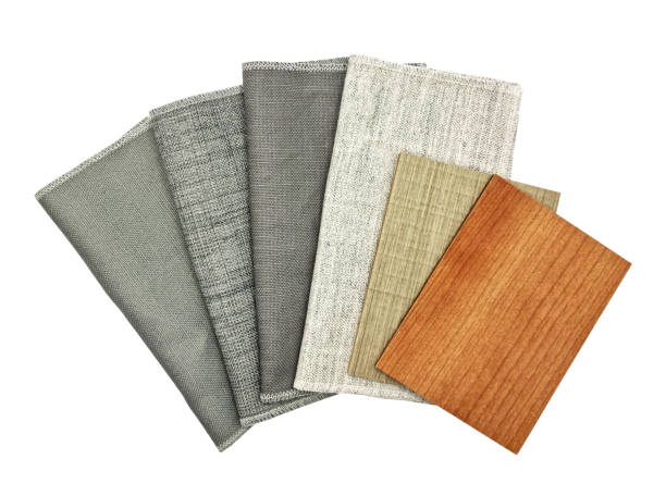 various texture of drapery fabric samples swatch in grey tone matching color with oak, ash wooden veneer samples isolated on white background with clipping path. interior finishing materials.