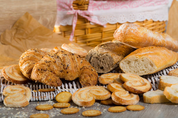 istock Assortment of fresh bread and  bakery products 1360034998