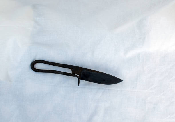 istock A black hand forged blacksmith knife on white background 1360035724