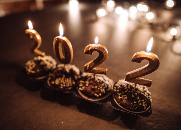 istock celebrating the 2022 new year with cup cakes 1360036330