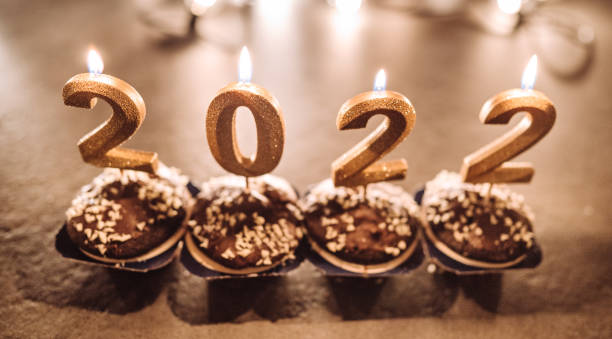 istock celebrating the 2022 new year with cup cakes 1360036349