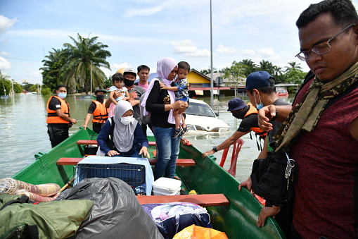 The flood victims evacuated by Royal Malaysia Police members at RTB Bukit Changgang, Dengkil, Sepang on December 20th, 2021.