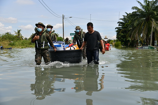 Members of Malaysian Armed Forces helping evacuation the flood victims at RTB Bukit Changgang, Dengkil, Sepang on December 20th, 2021.