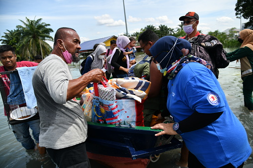 The flood victims evacuated by Royal Malaysia Police members at RTB Bukit Changgang, Dengkil, Sepang on December 20th, 2021.