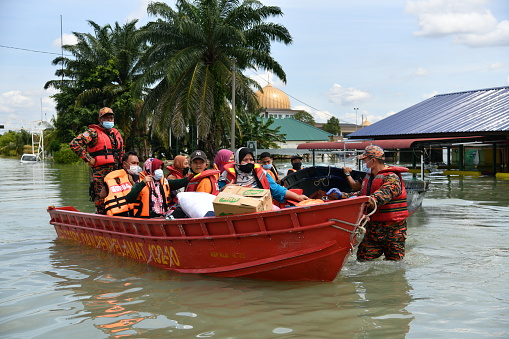 The members of Fire and Rescue Department of Malaysia evacuated the flood victims at RTB Bukit Changgang, Dengkil, Sepang on December 20th, 2021.