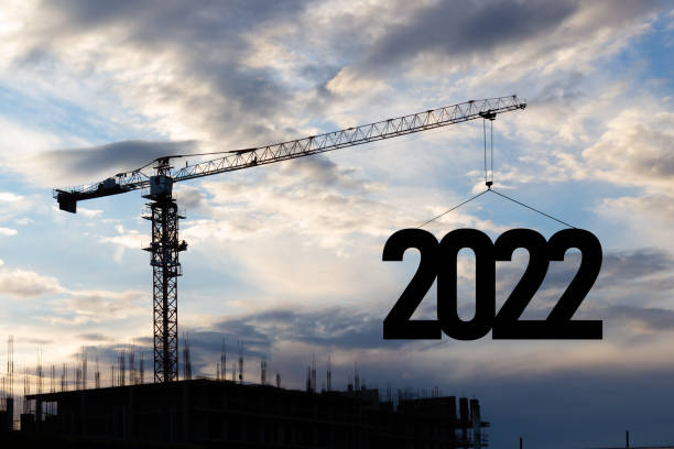 istock Construction crane lifts the 2022 1360044555