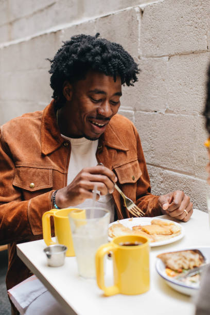 istock Couple at restaurant having breakfast 1360047157