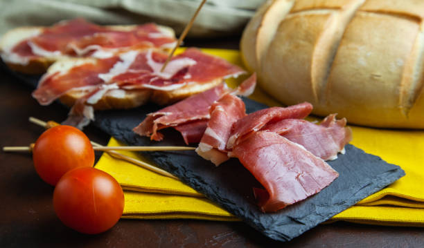 istock Spanish tapa of cured Serrano ham 1360056074