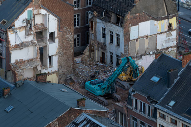 View of demolished old buildings with construction equipment. View of demolished old buildings with construction equipment. deconstruct stock pictures, royalty-free photos & images