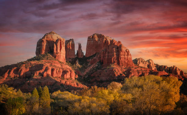 Sedona Arizona with red and orange sunset Sedona Arizona with red and orange sunset landscape arch photos stock pictures, royalty-free photos & images