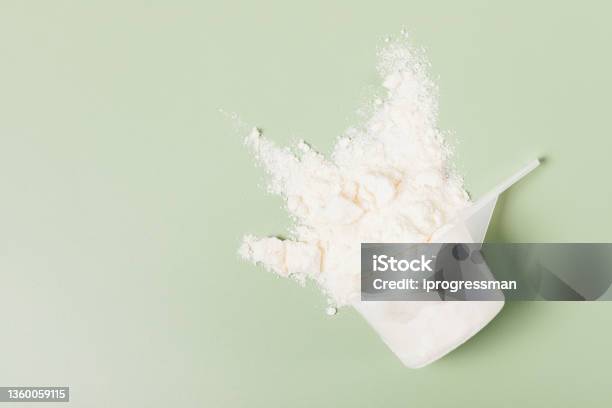 Whey Protein Powder Sports Nutrition Scattered From Measuring Stock Photo - Download Image Now