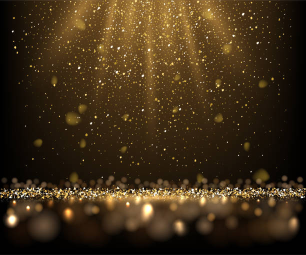 istock Golden glitter and sparkles in sun rays background. Yellow lines in shiny light vector illustration. Bright dust sparkling on black wallpaper design. Christmas or holiday card decoration 1360062763