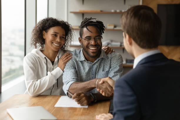 istock African couple shake hand financial advisor after sign contract 1360062808