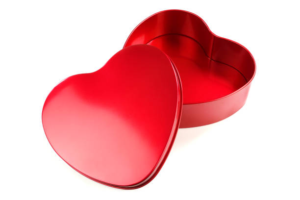 istock Red heart shape metal gift box isolated on white background. 1360068309
