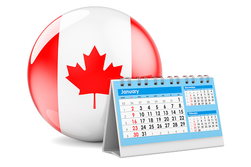 Desk calendar with Canadian flag. 3D rendering isolated on white background
