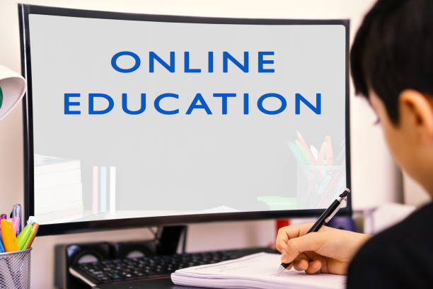 istock student working at home against computer with distance learning at home 1360073096