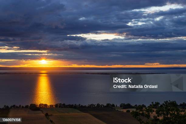 Sunset On The Lake Vättern In Sweden Stock Photo - Download Image Now - Beach, Beauty, Blue