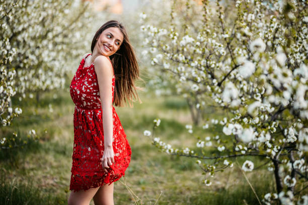 istock Young Woman In The Garden 1360075229