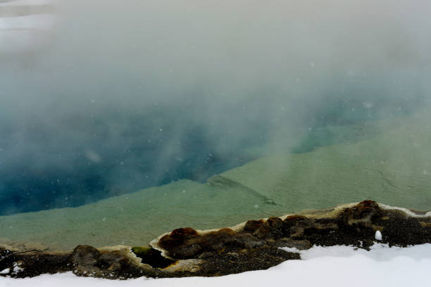 istock Winter Snowing Geothermal Pool Yellowstone 1360084286