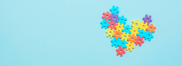 istock Autism spectrum with puzzle concept 1360087828