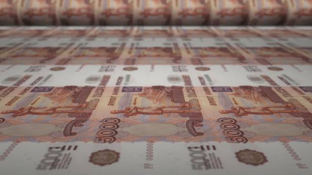 istock 5000 Russian rubles bills on money printing machine. 1360089677