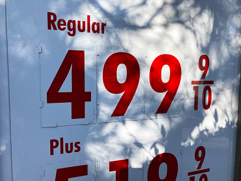 Prices top 5 dollars per gallon for gasoline in the United States. Close up.