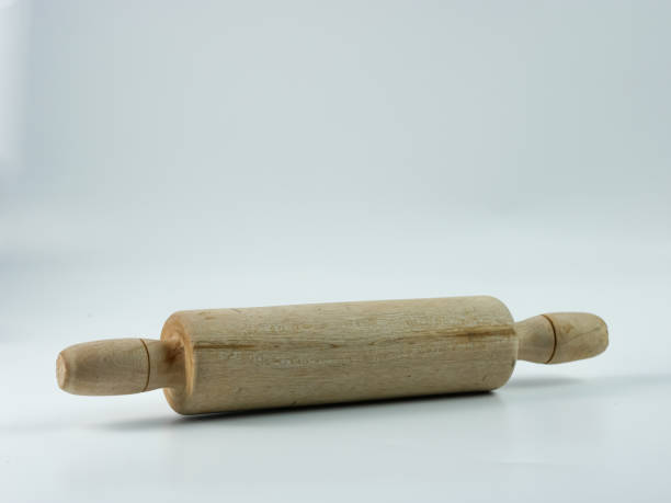 istock wooden rolling pin isolated on white background 1360105518