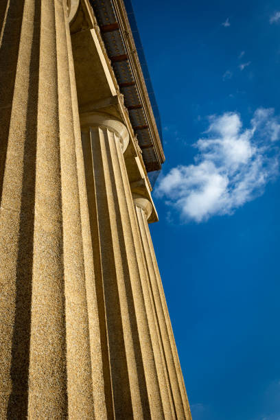 istock Columns supporting heavy load as an association of pillars of stability 1360108708