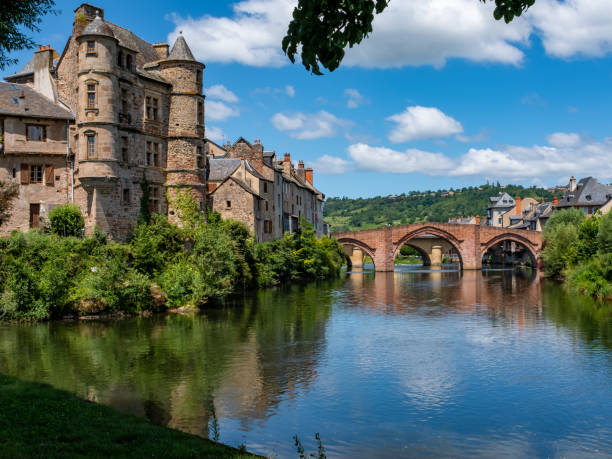 istock Espalion old town reflecting in the Lot river waters 1360110953