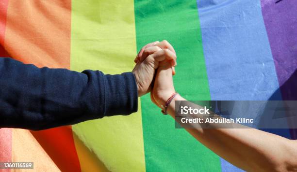 Couple Holding Hands Stock Photo - Download Image Now - LGBTQIA Rights, LGBTQIA Culture, LGBTQIA People