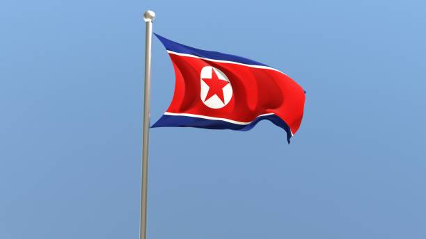 istock North Korean flag on flagpole. 1360120073