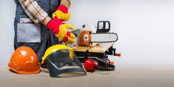 istock Worker puts on gloves, protective equipment for occupational safety  work.  lumberjack with protective equipment. Banner. 1360121863