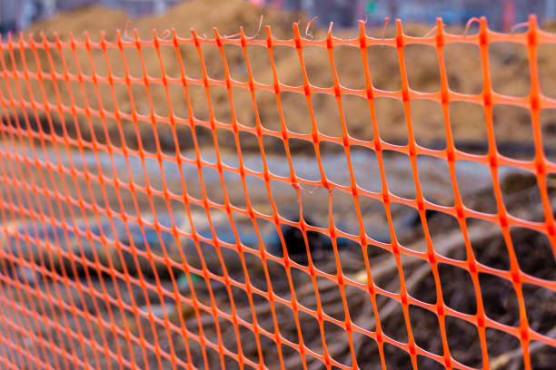 200+ Orange Construcción De Plástico De Malla De Seguridad Valla  Fotografías de stock, fotos e imágenes libres de derechos - iStock