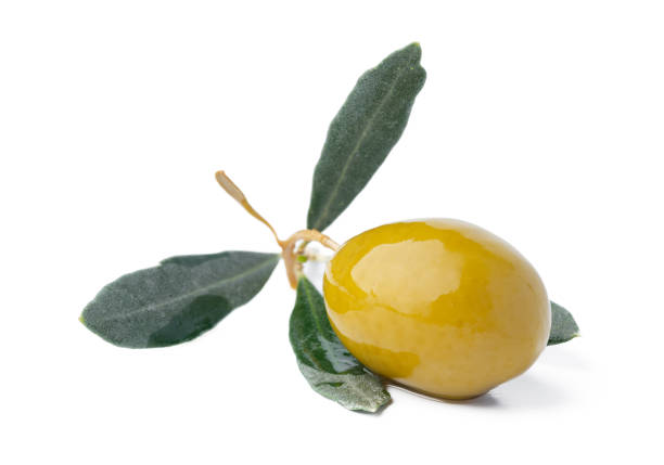 istock Green olives with leaves isolated on white background. 1360127722