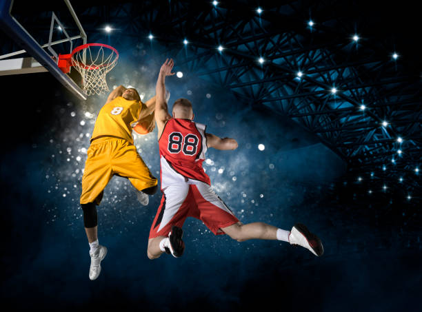 istock Two basketball players in action 1360132447