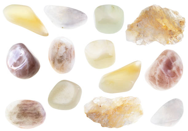 set of various moonstone stones cutout on white set of various moonstone stones cutout on white background feldspar stock pictures, royalty-free photos & images