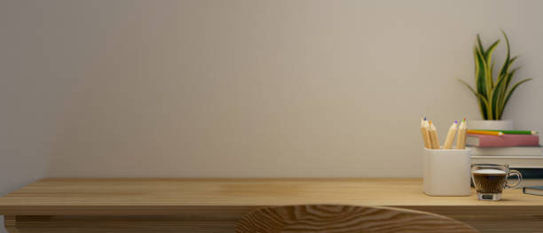istock Comfortable wooden table with stationery, and copy space 1360134939