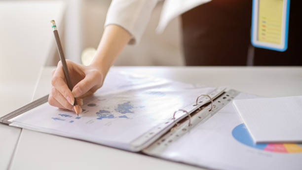 istock Close-up image of a manager explain and examine a financial report 1360135775