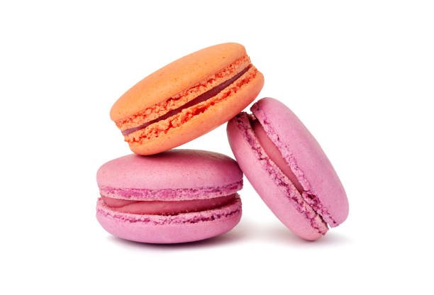 istock French macaroon cookies on white background. 1360139807