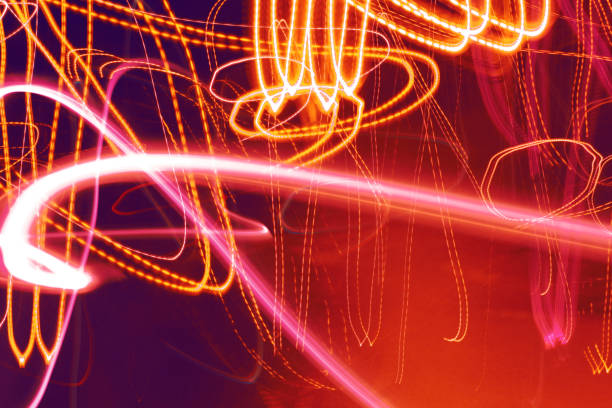 istock Defocused freezelight colorful background. Abstract pattern of freeze light curves. 1360139817