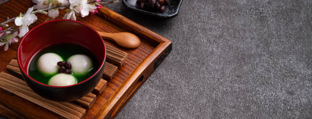 istock Matcha big tangyuan and matcha soup on gray table. 1360142778
