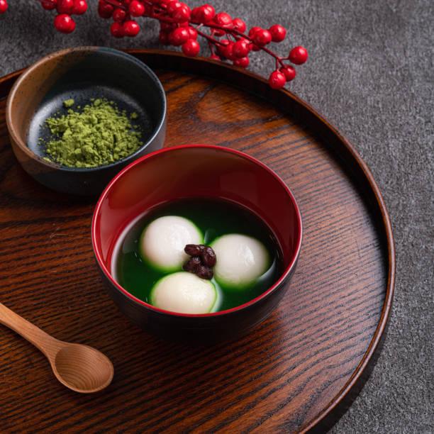 istock Matcha big tangyuan and matcha soup on gray table. 1360142779