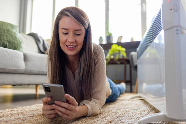 istock Smiling young woman relaxing at home. 1360142805
