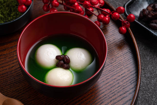 istock Matcha big tangyuan and matcha soup on gray table. 1360142815