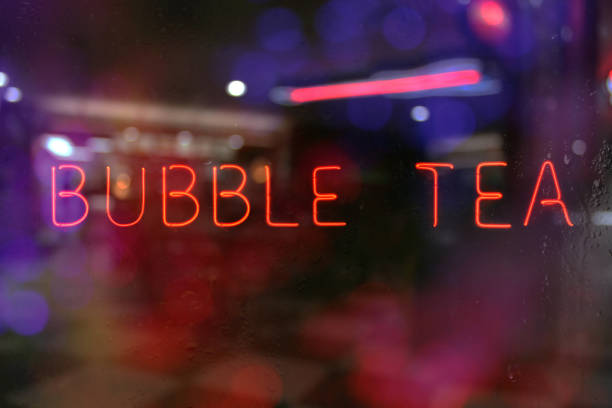 Neon Bubble Tea Sign in Window of Restaurant stock photo