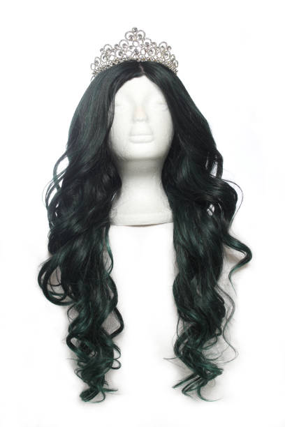 istock Black and Green Long Wig on Mannequin Head with tiara 1360143969