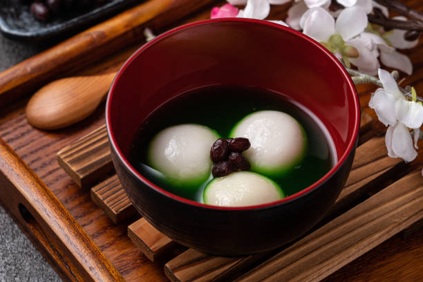 istock Matcha big tangyuan and matcha soup on gray table. 1360143984