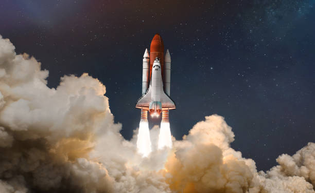 Space shuttle in sky with stars and clouds. Rocket in deep space sci-fi concept. Astronauts and spaceship. Elements of this image furnished by NASA Space shuttle in sky with stars and clouds. Rocket in deep space sci-fi concept. Astronauts and spaceship takeoff stock pictures, royalty-free photos & images