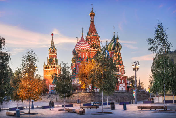 istock Spasskaya Tower and St. Basil's Cathedral in Moscow 1360147569